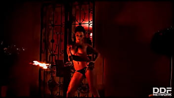 Flaming hot sexy pyromaniac plays with fire