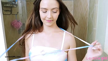 Dark haired fashion icon enjoys a sensual bath