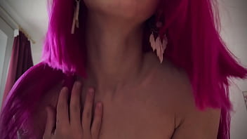 Seductive strip dance of a young lady with fancy hair