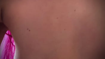 Seductive strip dance of a young lady with fancy hair