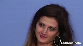 Flirty beauty gets cumshot on her face sucking all the load