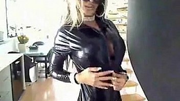Busty reveals her tits on latex