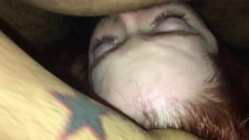 Redhead made to take black cock in her mouth