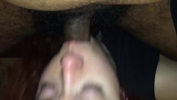 Redhead made to take black cock in her mouth