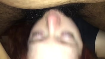 Redhead made to take black cock in her mouth