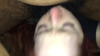 Redhead made to take black cock in her mouth