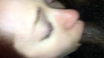 Redhead made to take black cock in her mouth