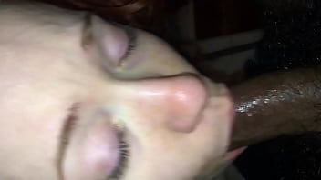 Redhead made to take black cock in her mouth