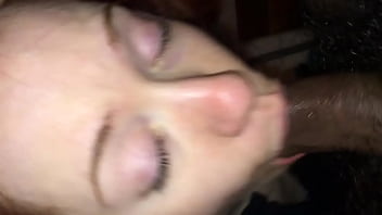 Redhead made to take black cock in her mouth