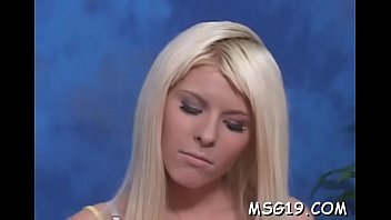 Cute masseuse shows off body