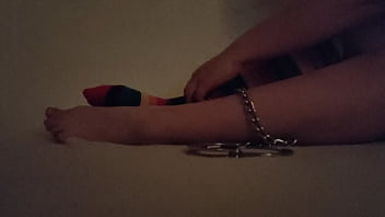 Cuffed feet tease