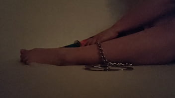 Cuffed feet tease