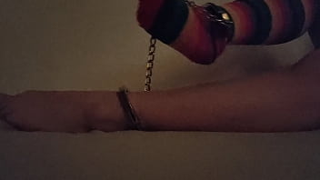 Cuffed feet tease