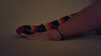 Cuffed feet tease