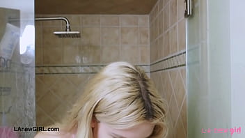 Pretty teen model enjoys a sensual shower