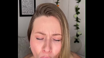 Blonde sucks big dildo on camera