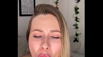 Blonde sucks big dildo on camera