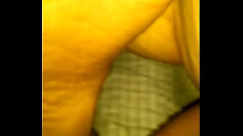 Hitting it behind her flexable legs