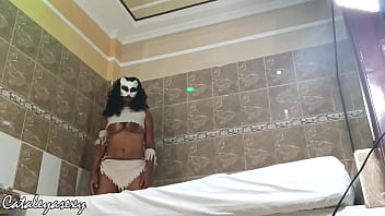 Huge tits ebony model changes her costume and poses for camera