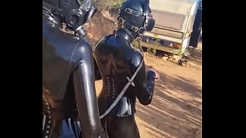 Latex pony action in portuguese with discipleofdevotion full rubber action in the heat