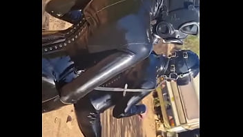 Latex pony action in portuguese with discipleofdevotion full rubber action in the heat