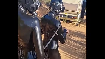 Latex pony action in portuguese with discipleofdevotion full rubber action in the heat