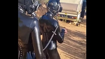 Latex pony action in portuguese with discipleofdevotion full rubber action in the heat