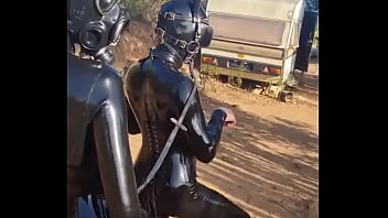Latex pony action in portuguese with discipleofdevotion full rubber action in the heat