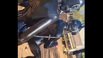 Latex pony action in portuguese with discipleofdevotion full rubber action in the heat