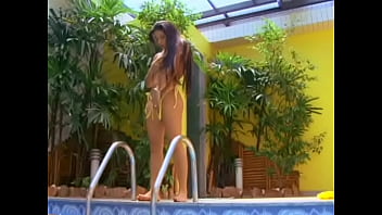 Brunette gets a poolside fuck