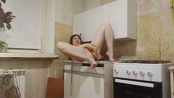 Double penetration with bananas in the kitchen