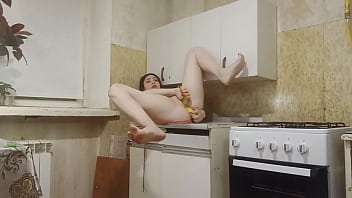 Double penetration with bananas in the kitchen