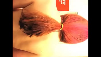 Bigtit red head playing with web cam