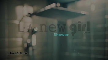 Aspiring brunette model enjoys a sensual bath