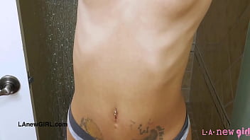 Aspiring brunette model enjoys a sensual bath