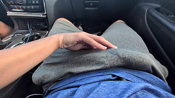 Rubbing his cock in his shorts in public