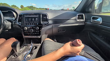 Rubbing his cock in his shorts in public