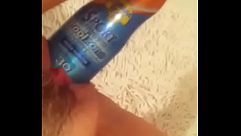 Toying with suncream bottle