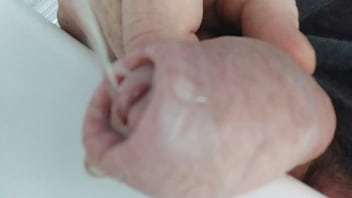 Pissing in the sink just before the late shift