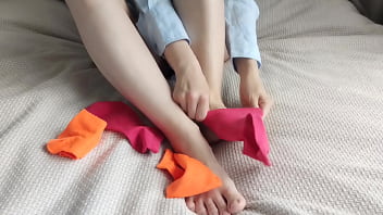 Brightly coloured mismatched socks were perfect for a sensual sockjob