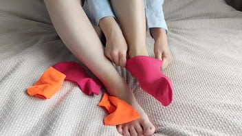 Brightly coloured mismatched socks were perfect for a sensual sockjob