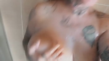 Showering milf alone