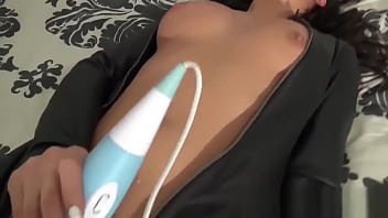 Brunette in leather catsuit masturbating to orgasm