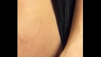 Woman in leather showing off