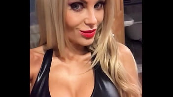 Woman in leather showing off