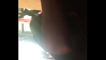 Black man eats sushi