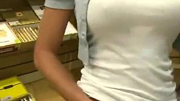 Blonde girl flashes on cigar store