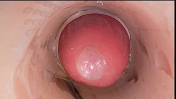 The camera in the deep pussy records a huge ejaculation of sperm into the condom The camera in the deep pussy records a huge ejaculation of sperm into the condom