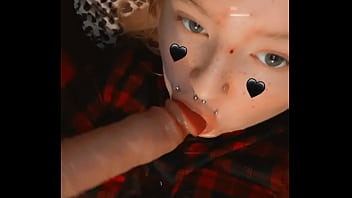 Slutty goth girl licks her sex toy then puts it inside of her