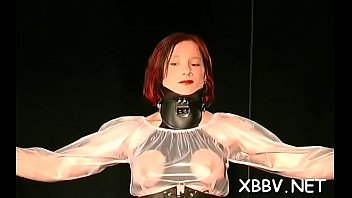 Aroused floozy is posing for the camera and teasing